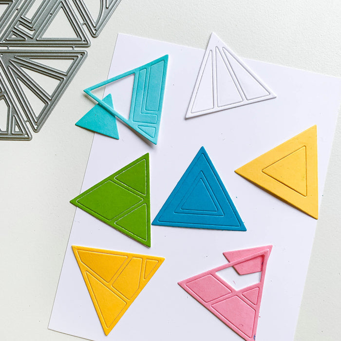 Catherine Pooler - Dies - Mosaic Tile. Add a patterned triangle die or three to your next card with the Mosaic Tile Dies. This set of 8 geometric dies will bring a pop of interest to your card and can be layered over blended backgrounds or inlaid with patterned papers. Try them with our Sketchbook Patterned Paper. Available at Embellish Away located in Bowmanville Ontario Canada.