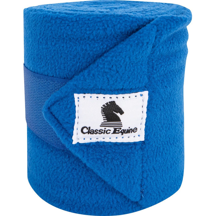Classic Equine Classic Polo Wrap shown rolled up and closed by its velcro strap and displaying the Classic Equine cloth logo label. Shown in royal blue.