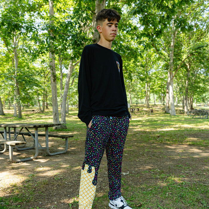 Adult model wearing ice Cream Pajama Pants Midnight Sundae pants