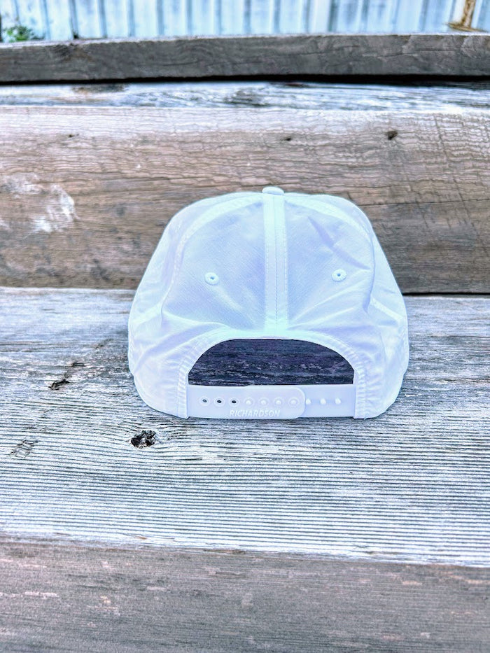 Southern Bred Apparel Co Starkville, MS white cap with black rope.
Rear View