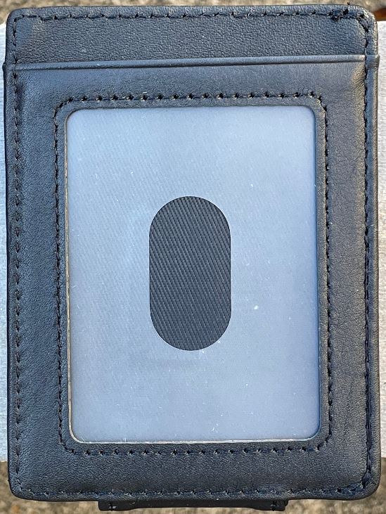 A black full grain leather money clip with ID slot, from Top Notch Accessories. Showing clear ID window.