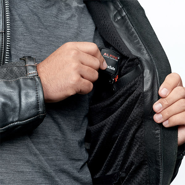man putting earplugs in pocket