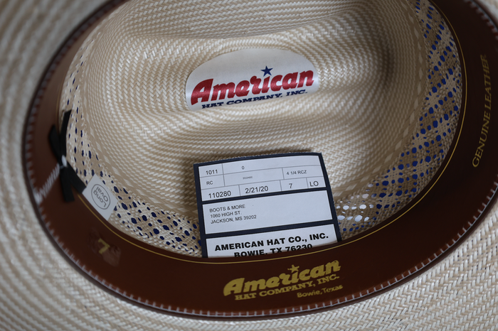 Inside view American Hat Company straw hat featuring leather sweat band.