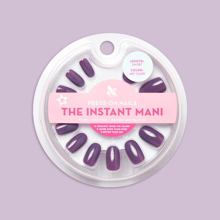 Art Class - Press-On | Short | Round showing purple short round false nails in circular clear case on lavender background