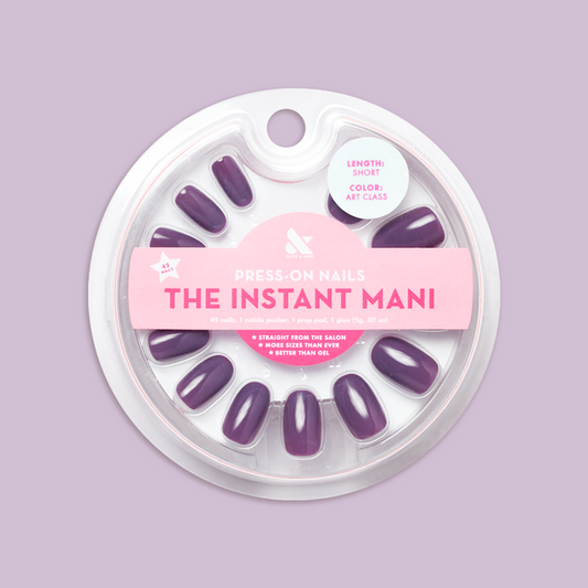 Art Class - Press-On | Short | Round showing purple short round false nails in circular clear case on lavender background
