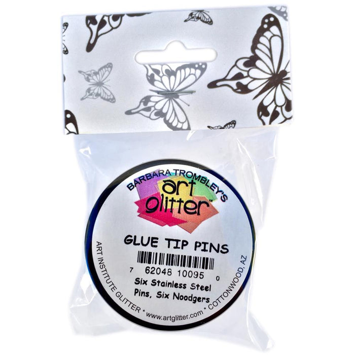 Use a stainless steel pin to insert in the hole of the applicator top of the Art Glitter Designer Adhesive to keep the glue from drying out between uses. Use a Noodger to push a line of glitter into place or to remove glitter. It is also helpful for whisking away embossing powders. Made in USA. Available at Embellish Away located in Bowmanville Ontario Canada.