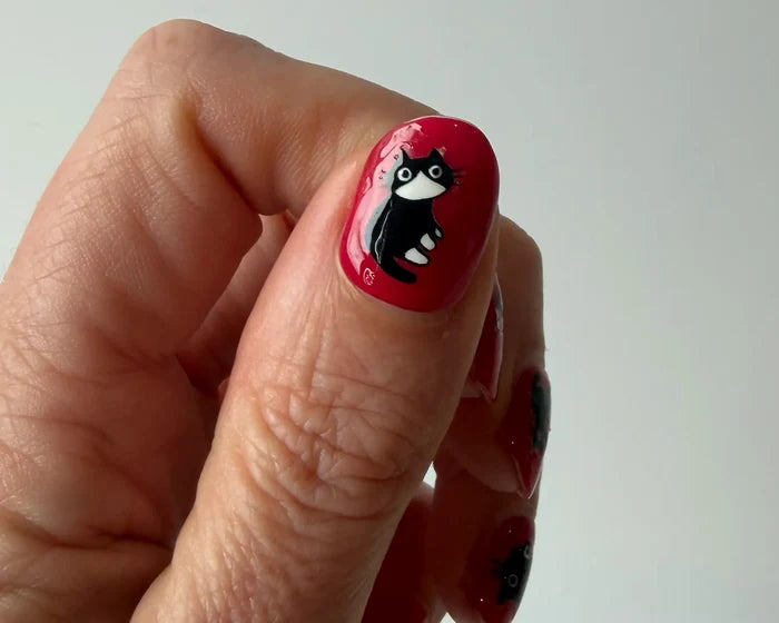 Black Cats nail art decals, close-up