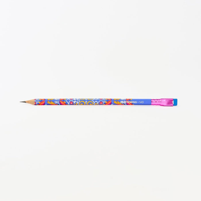 A colorful wooden pencil with a blue body, vibrant multicolor floral pattern, a pink ferrule, and a blue eraser shown horizontally against a plain white background.