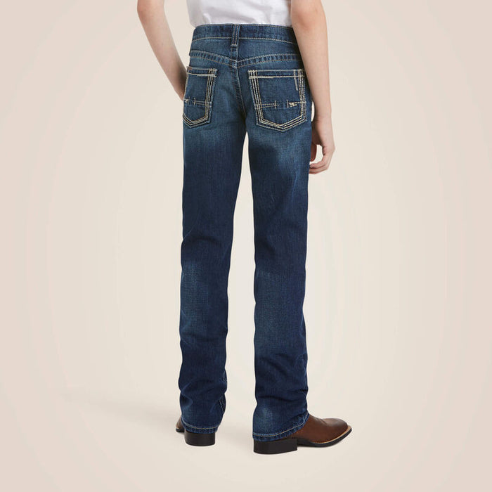 Boy's Ariat B5 Slim Fit jeans in a dark wash.  Rear view showing stitching on pockets.