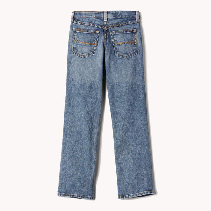 Boy's Ariat M5 slim straight jeans, in a medium wash. Rear view jeans laid flat.