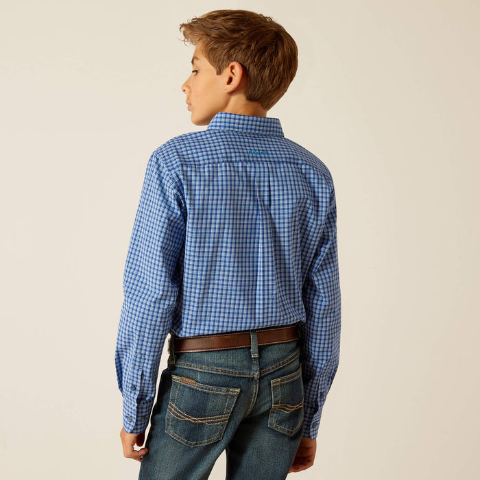 Boy's Ariat long sleeve Pro Series shirt in Blue Plaid. Rear view showing shirt tucked in and blocked Ariat logo on back yoke.