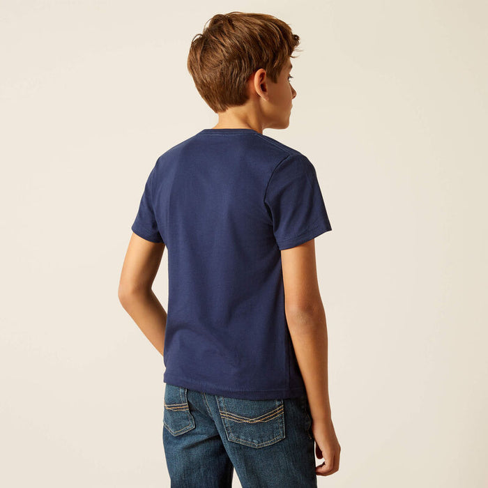 Boy's Ariat short sleeve t-shirt in Dark Navy with a "Yee Haw" Graphic print on front showing a cowboy roping a jackalope. Rear view showing shirt untucked.
