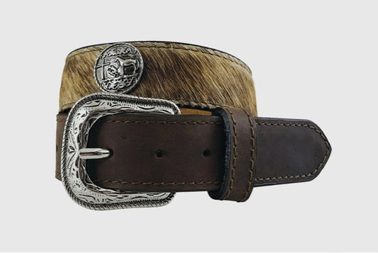 A brown hair-on leather belt with hand tooled designs and praying cowboy figurine conchos, featuring a silver finish buckle.