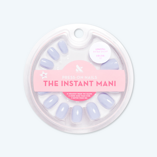 BP - Press-On | Extra Short | Round showing light icy blue extra short round false nails in circular clear packaging