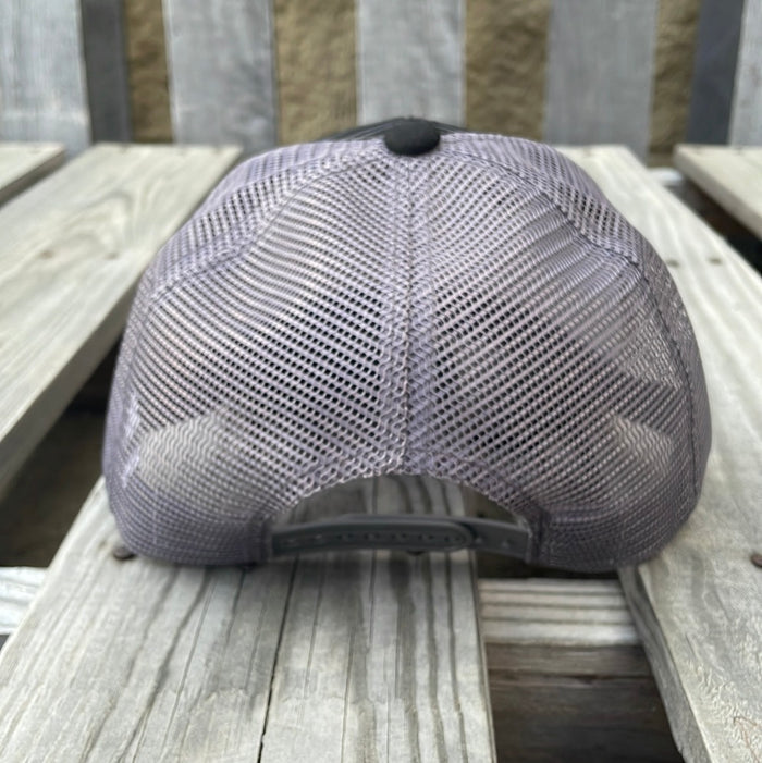 Black trucker cap with Grey stripes, Grey mesh back, a solid black bill and a Serape Cactus Patch. Rear View