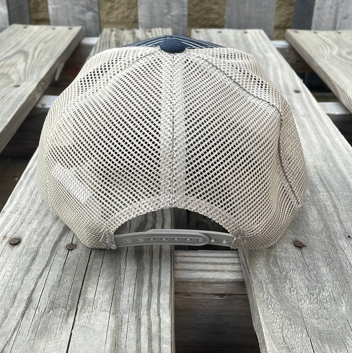 Navy and Grey trucker cap with a striped pattern featuring a cactus patch design on the front, solid Navy bill, Grey mesh back. Rear View