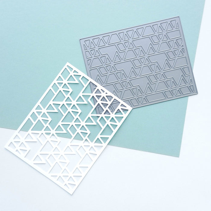 Catherine Pooler - Cover Plate Die - Triangle. A fun mountain and valley pattern that can create interesting backgrounds, or layer this fun geometric shaped die over colorful background technique pieces. Use it as a whole or mask shapes for a unique focal point to your projects.  The Triangle Cover Plate Die A2 size card.  Tip - Cut it out of heavy weight cardstock or acetate and create your own stencil. Available at Embellish Away located in Bowmanville Ontario Canada.