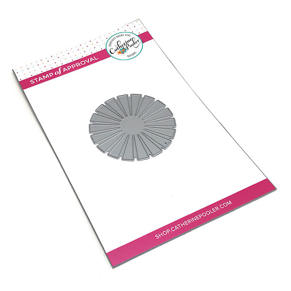 Catherine Pooler - Die - Sunburst. The perfect embellishment for any card. Use it as a sun, flower or just quirky accent.  Fun idea - Cut the sunburst die out of acetate or heavy cardstock and use as a stencil along with your favorite art medium.  The Sunburst Die measures 2 1/2" x 2 1/2".  Illustrated by Shawna Clingerman. Available at Embellish Away located in Bowmanville Ontario Canada.