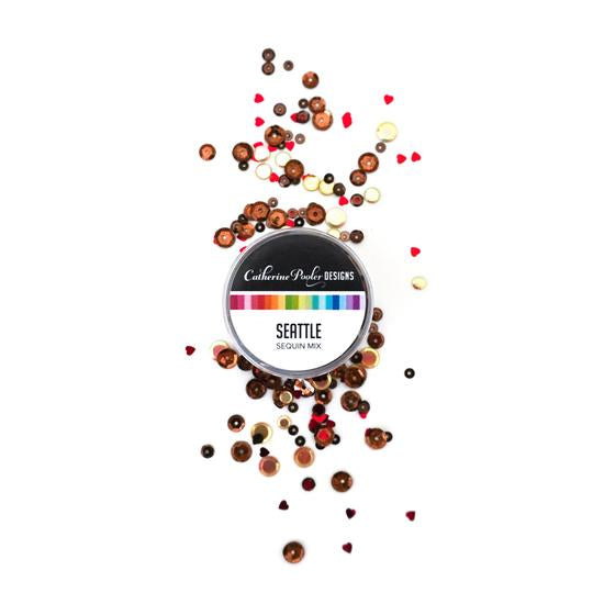 Catherine Pooler - Sequin Mix - Seattle. Home of the popular coffee café chain, Seattle, Washington is a perfect spot for sipping a hot cup of java on a chilly, rainy Pacific Northwest day.  In celebration of the bean, the Seattle Sequin Mix is full of beautiful dark roasted brown and latte colored sequins with pops of metallic and hologram shine.  Available at Embellish Away located in Bowmanville Ontario Canada.