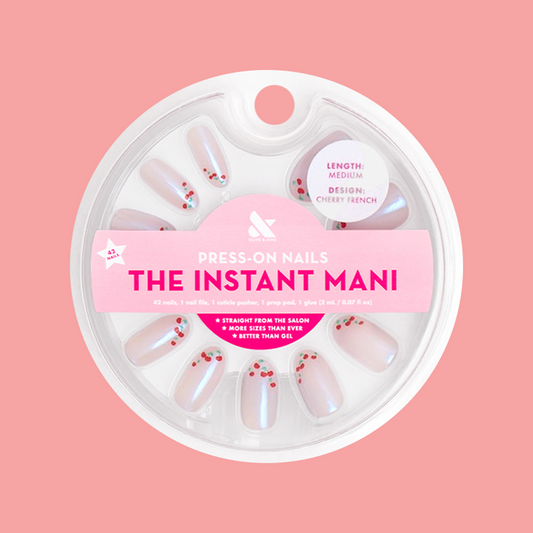 Cherry French - Press-On | Medium | Oval false nails with classic French tips and cherry accents for easy at-home manicure.