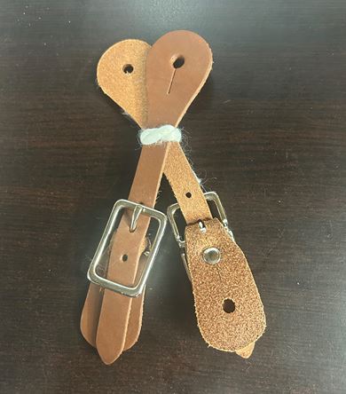 Children's leather spur straps with a buckle, in natural color.