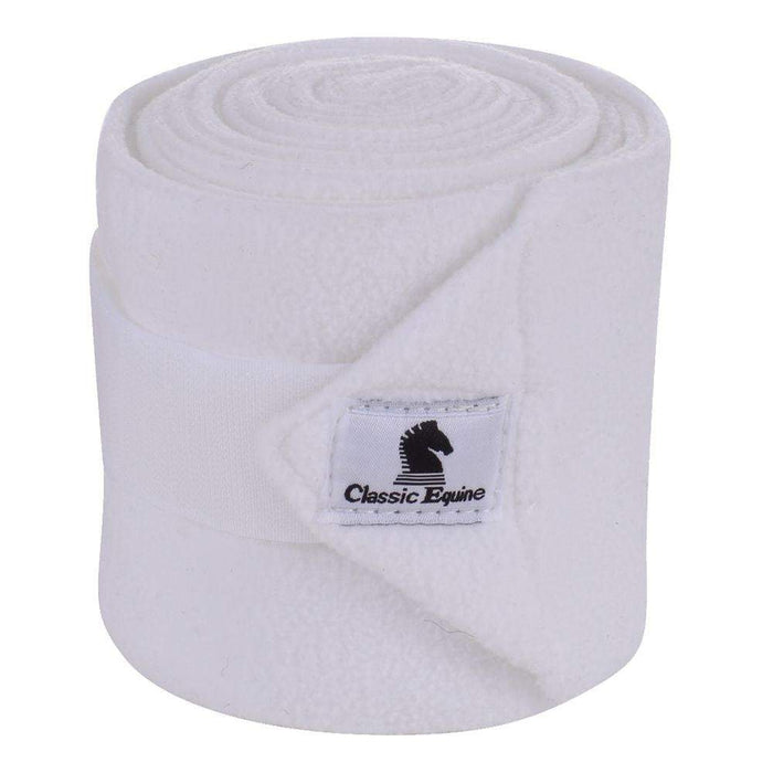 Classic Equine Classic Polo Wrap shown rolled up and closed by its velcro strap and displaying the Classic Equine cloth logo label. Shown in white.