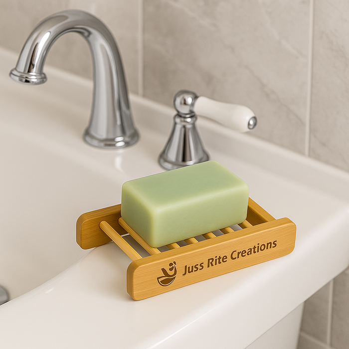 Wooden soap dish with a bar of soap on a bathroom sink, featuring 'Juss Rite Creations'.