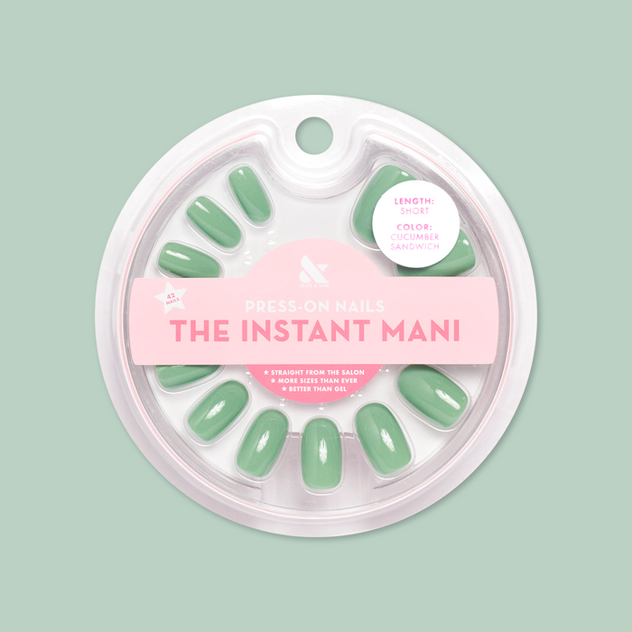 Cucumber Sandwich - Press-On | Short | Round showing green short round false nails in clear circular packaging on pale background