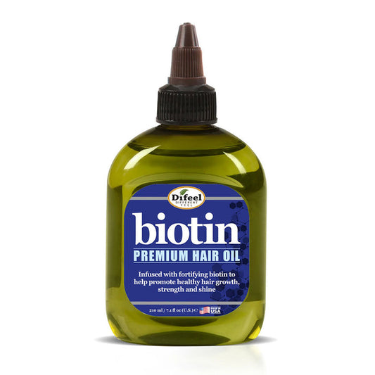 Difeel biotin hair oil for hair growth green squeeze bottle labeled premium hair oil for stronger hair