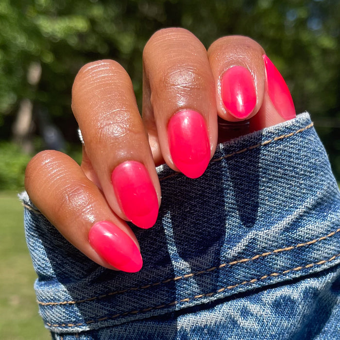 Double Pink Jelly French - Press-On | Medium | Almond vibrant medium almond press-on nails with glossy pink jelly finish outdoors
