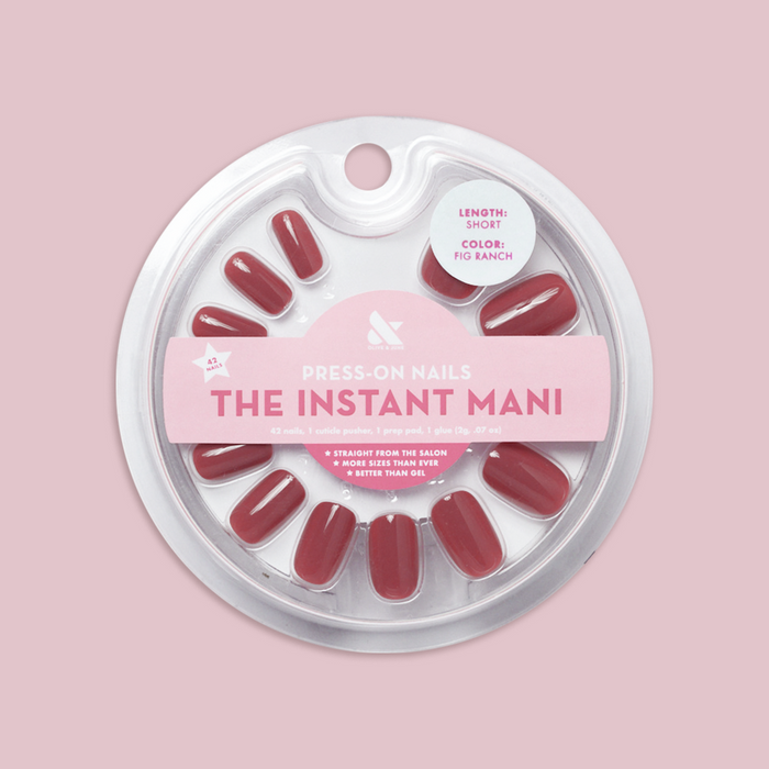 Fig Ranch - Press-On | Short | Squoval showing short squoval cool-toned fig pink press-on false nails in round package on pink background