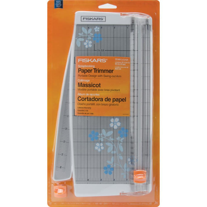 FISKARS-Euro Paper Trimmer. This trimmer features the triple track blade and rail system, a swing-out arm that extends the measuring deck to 15 inches, an ergonomic carriage for a better grip while cutting, and rubberized feet for stability. Available at Embellish Away located in Bowmanville Ontario Canada.
