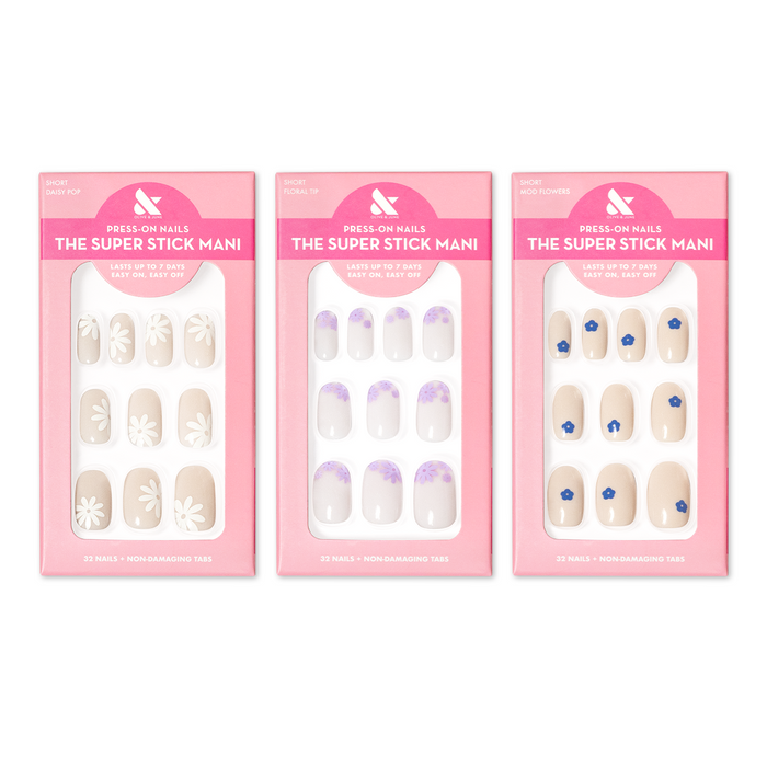 Floral Trio showing three sets of beige and white press-on nails with daisy and blue flower designs for easy at-home mani
