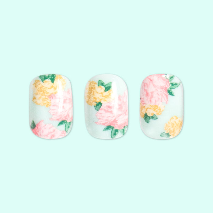 Full Floral - Press-On | Extra Short | Squoval showing floral extra short squoval press-on nails with pink and yellow petals