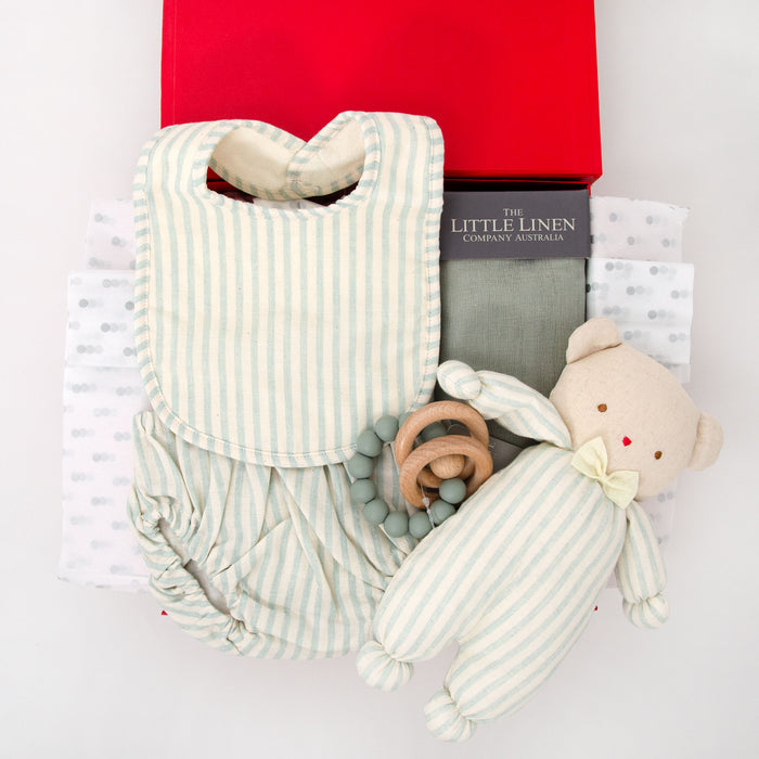 Hamper includes mint-coloured cotton bib, nappy cover, cuddle bear, Little Linnen Company Muslin and Beechwood and silicone teething ring. Price: $145