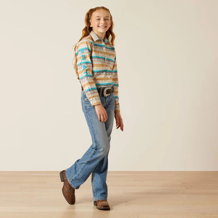 Girl's Ariat blue and brown Serape Print long sleeve Team logo shirt. Full front view showing shirt tucked in.