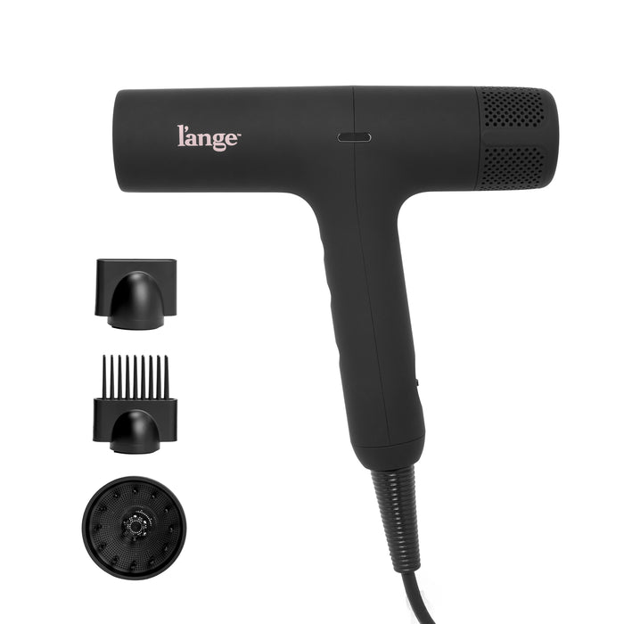 Black HAUTEAIR hair dryer next to attachments on a blank background