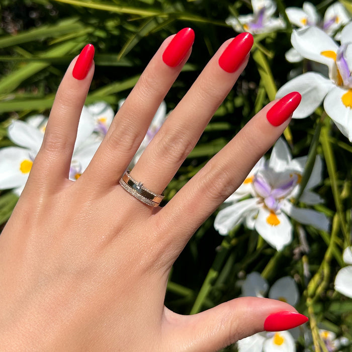 Hibiscus - Press-On | Medium | Oval showing hand with medium oval bright pink nails outdoors near white flowers