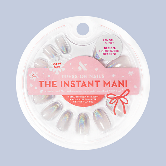 Holographic Gradient - Press-On | Short | Round neutral short round nails with shimmery holographic gradient in circular packaging