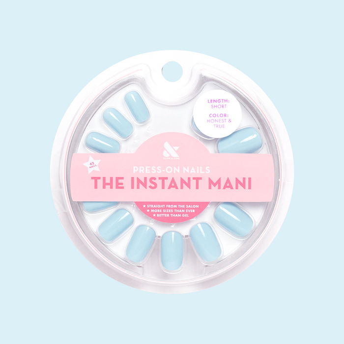 Honest & True - Press-On | Short | Squoval showing serene blue short squoval press-on nails in round clear packaging