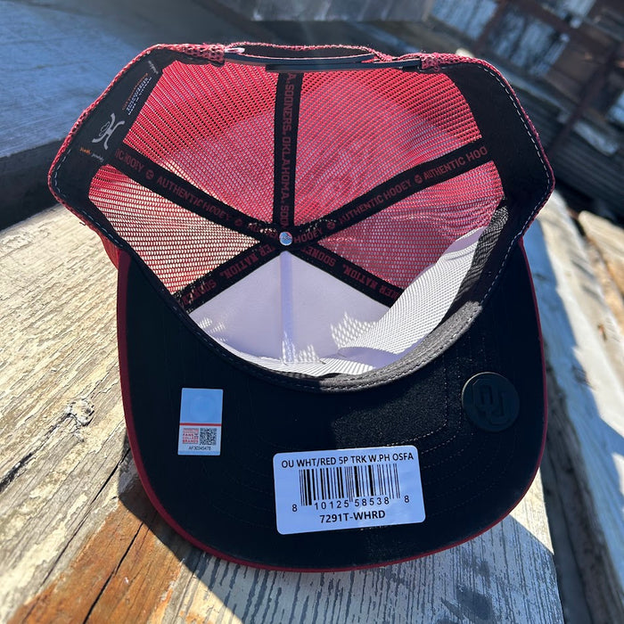 Red and white snapback cap with Oklahoma state outline and OU logo patch. Inside view
