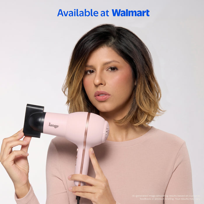 Woman with short bob holding L'ange Hot Stuff blush hair dryer with concentrator attachment. "Available at Walmart"