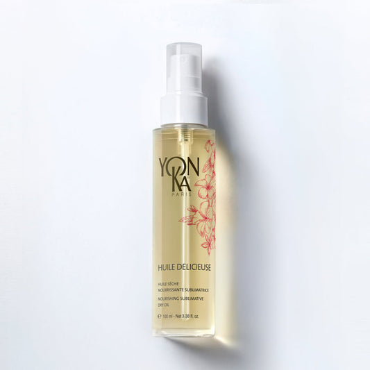 Huile Delicieuse bottle with tiare and jasmine flowers fast-absorbing botanical body and hair oil