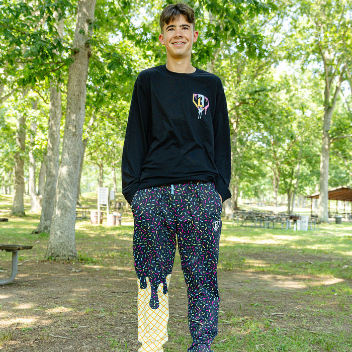 Adult model wearing ice Cream Pajama Pants Midnight Sundae pants