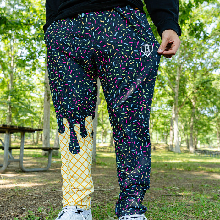 Adult model wearing ice Cream Pajama Pants Midnight Sundae pants