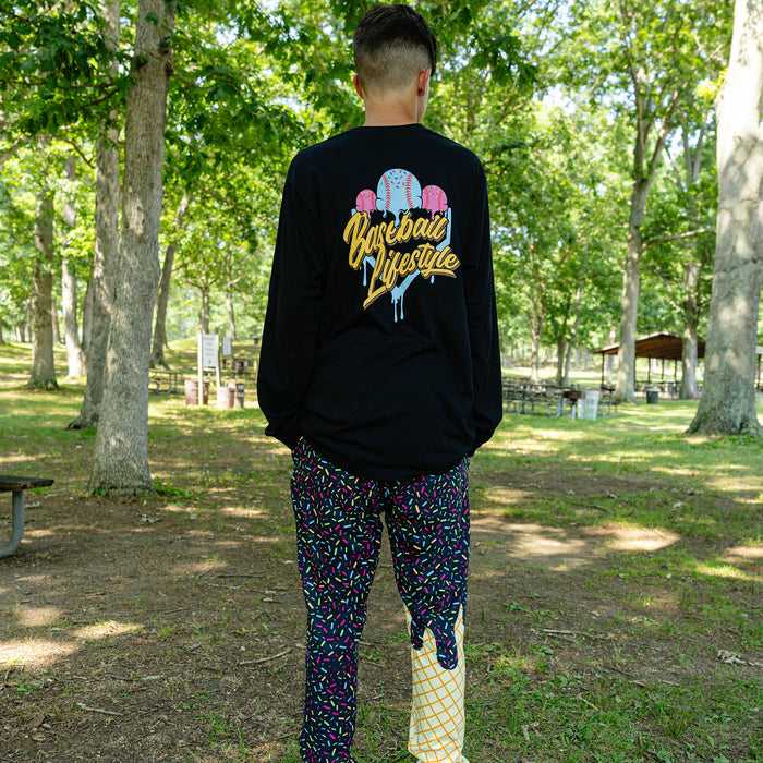 Adult model wearing ice Cream Pajama Pants Midnight Sundae pants