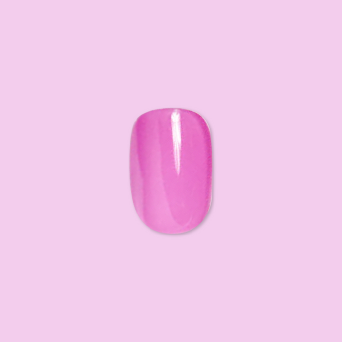 Jam, Please - Press-On | Extra Short | Squoval showing single extra short soft magenta false nail on pink background