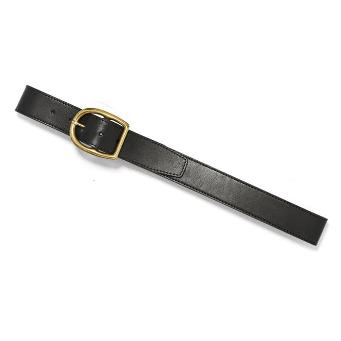 Ladies black leather belt with brass buckle, aerial laid flat view.