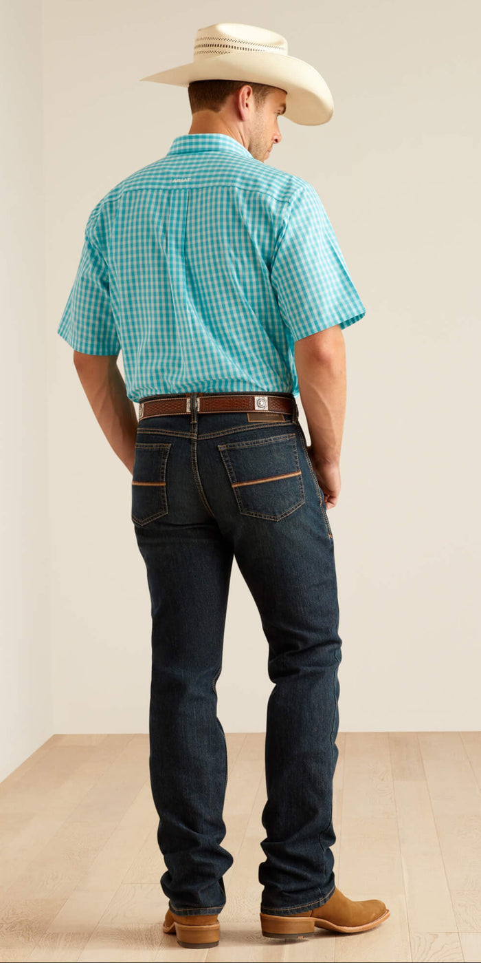 Men's Ariat M4 dark wash Pro series relaxed fit boot cut jean. Full Rear View