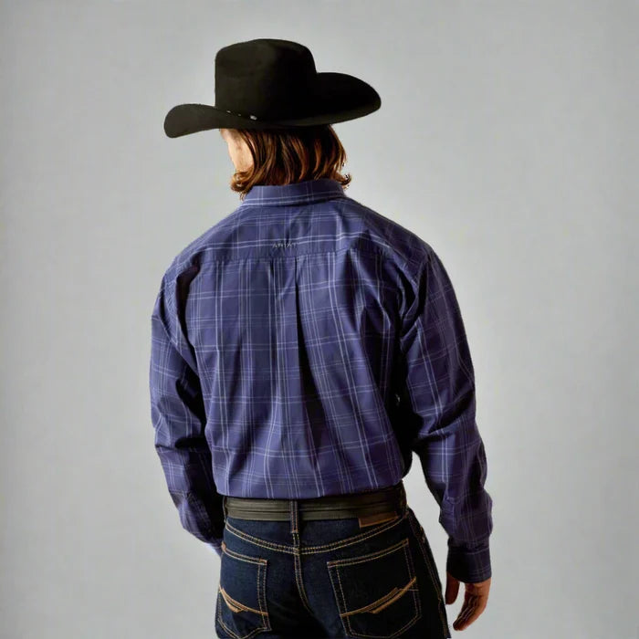 Men's Ariat long sleeve classic fit shirt in Navy. Rear view showing shirt tucked.